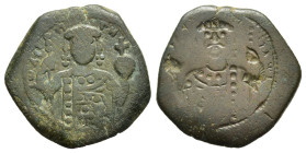 JOHN II COMNENUS (1118-1143). Tetarteron. Thessalonica. 

Obv: Reverse brockage.
Rev: Crowned bust of John II facing, holding scepter in right hand an...