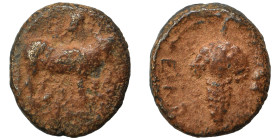 EUBOIA. Euboian League, circa 3rd century BC. Ae (bronze, 1.74 g, 12 mm). Bull standing to left. Rev. Grape bunch. Nearly very fine.