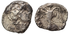 Uncertain. Ar (silver, 0.59 g, 9 mm). Helmeted bust, right. Rev. Victory standing left. Nearly very fine.