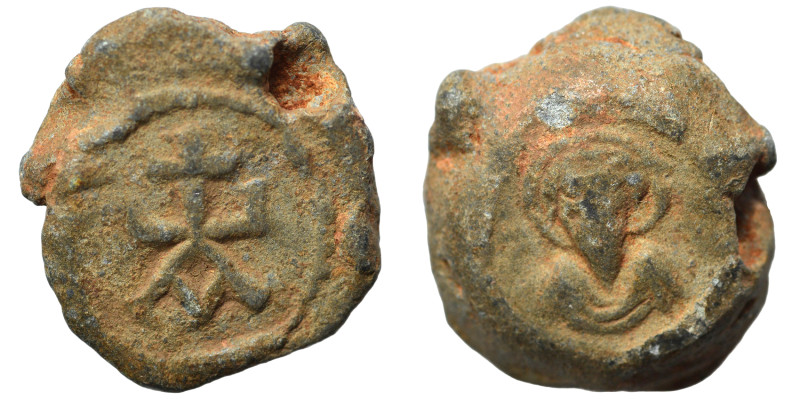 Roman seal, circa 5-6 century (lead, 7.48 g, 17 mm). Facing bust. Rev. Monogram....