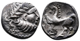 Middle Danube Tribes ''Kugelwange" type. AR Drachm (15mm, 2,17g.) Imitating the types of Philip II of Macedon. 3rd. Century BC. Celticized laureate he...