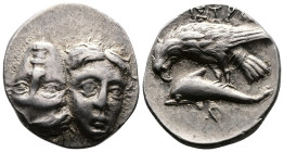 Moesia. Istros. 4th. century BC. AR Drachm (18,5mm, 5,30 g.). Facing male heads, the left inverted Rev. Sea eagle left, grasping dolphin with talons; ...