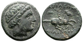 Kings of Macedon. Philip III Arrhidaios (323-317 BC.) AE (18,5 mm, 5.19 g.). Miletos mint, struck ca. 323-319 B.C. Head of Apollo right, wearing taini...