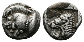Mysia. Kyzikos. ca. 450-400 BC. AR Trihemiobol (10mm, 1.21g.). Forepart of boar left; to right, tunny upward behind. Rev. Head of roaring lion left wi...
