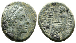 Ionia. Smyrna. Ca. 75-50 BC. Æ (21mm. 9,11 g.) Laureate head of Apollo r. Rev. ΣMYPNAΙΩN – EPMOKΛHΣ – EPI KPATH Homerus seated l., holding scripture r...