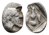 Ionia . Magnesia ad Maeander. Archepolis, son of Themistokles, ca. 459 BC. AR Tetartemorion (7mm, 0.12 g.). Diademed and bearded male head to right. R...
