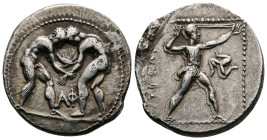Pamphylia. Aspendos. Ca. 420-370 BC. AR stater (22,5mm, 10.77 g.) Two wrestlers grappling; AΦ between, Rev. EΣT[FEΔIIYΣ], slinger striding to right, p...