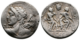 Lucius Caesius. 112-111 BC. AR Denarius (19,5mm, 3.17 g.) Bust of Vejovis left, seen from behind, hurling thunderbolt; AR monogram behind. Rev. The tw...