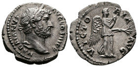 Hadrian (117-138 AD.) AR Denarius (18mm, 2,94g.) Rome, 134-138 AD. HADRIANVS AVG COS III P P, laureate head right. Rev. VICTORIA AVG, Victory standing...