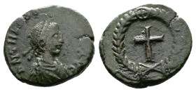 Theodosius II (402-450 AD.) AE 4 (13,5 mm, 1.40 g.) DN THEOD[OSIVS P F AVG], pearl-diademed, draped, and cuirassed bust right. Rev. Cross within wreat...