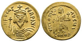 Phocas (602-610 AD.) AV Solidus (21mm, 4.43 g. Gold), Constantinople. d N FOCAS PERP AVC Draped and cuirassed bust of Phocas facing, wearing crown and...