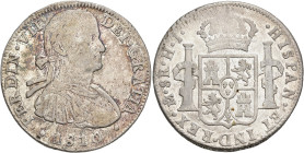 FERNANDO VII. 8 reales. 1810. México. HJ. AR 26,86 g. 39,3 mm. VI-1086. Pátina irregular. MBC-/MBC.