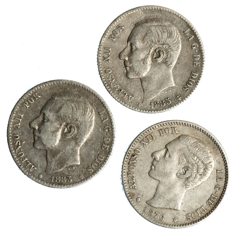 ALFONSO XII. Lote de 3 piezas de 1 pta.: 1876, 1883 y 1885 MSM. MBC-/MBC.