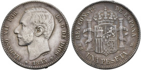 ALFONSO XII. 1 peseta. 1885*18-86. Madrid. MSM. AR 4,86 g. 23 mm. VII-63. Finas rayas en anv. MBC+/MBC.