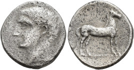 HISPANIA ANTIGUA. Acuñaciones hispano-cartaginesas. 1/2 shekel. A/ Cabeza masculina a izq. R/ Caballo parado a der. AR 3,4g. 16,8 mm. I-550; ACIP-607....