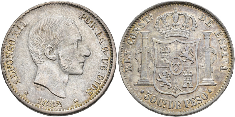 ALFONSO XII. 50 centavos de peso. 1882. Manila. AR 12,89 g. 29,8 mm. VII-77. R.B...