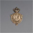 ÓRDENES Y CONDECORACIONES. Isabel II. Condecoración. Campaña de África. 1860. Metal blanco con su corona. 26,14 g. 58,3 x 39 mm. G-725. MBC+.