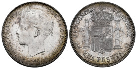 Alfonso XIII (1886-1931). 1 peseta. 1902*19-02. Madrid. SMV. (Cal-64). Ag. 5,02 g. Delicate patina. Original luster. Mint state. Est...500,00. 

Spa...