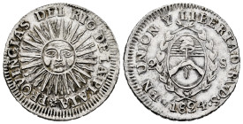 Argentina. 2 reales. 1824. Provincias Del Río de la Plata. (Km-18). Ag. 6,65 g. A good sample. Scarce. Choice VF. Est...350,00. 

Spanish Descriptio...