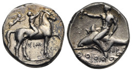 CALABRIA. Tarentum. Circa 330-325 BC. Nomos or didrachm (Silver, 20.0 mm, 7.73 g), struck under the magistrates Sim... and Her... Naked ephebus seated...