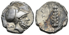 LUCANIA. Metapontum. Circa 340-330 BC. Nomos (Silver, 21.20mm, 7.60 g). Helmeted head of Leukippos to right; behind, AMI. Rev. META Barley ear with le...