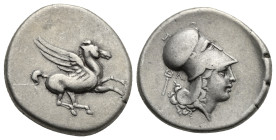 AKARNANIA. Leukas, circa 350-320 BC. Stater (Silver, 23 mm, 8.48 g) Pegasus flying right. Rev. Head of Athena right wearing Corinthian helmet, caduceu...