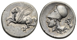 CORINTHIA. Corinth. Circa 350-300 BC. Stater (Silver, 22.10 mm, 8.55 g). Pegasus flying left, Ϙ below. Rev. Helmeted head of Athena left, wearing Cori...
