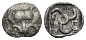 DINASTS OF LYCIA. Mithrapatra. Diobol (Silver, 13.00 mm, 1.41 g) Phellos mint ?, circa 390-370 BC. Facing lion’s scalp. Rev. Triskeles, dolphin swimmi...