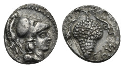 CILICIA. Soloi. Circa 350-300 BC. Obol (Silver, 8.30 mm, 0.66 g). Head of Athena to right, wearing Corinthian helmet . Rev. [ΣΟΛ]ΕΩΝ Large bunch of gr...
