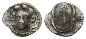 CILICIA. Uncertain mint. 4th century BC. Obol (Silver, 11.50 mm, 0.63 g). Draped bust of Athena facing slightly left, wearing triple-crested helmet an...