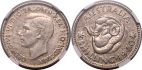 AUSTRALIA. George VI. 
Silver 1 shilling, 1940. Melbourne. 
Obv: GEORGIVS VI D:G:BR:OMN:REX F:D:IND:IMP., bare head left. Rev: AUSTRALIA, head of Me...