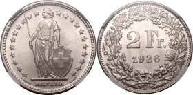 SWITZERLAND. 
Silver 2 francs, 1936 B. Bern. 
Obv: Helvetia standing left holding spear and shield with coat of arms of Switzerland; HELVETIA in exe...