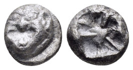 MYSIA. Parion.(5th century BC).Drachm.

Obv : Facing gorgoneion with protruding tongue.

Rev : Disorganized linear pattern within incuse square.
SNG B...