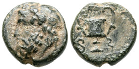 LYDIA, Sardes. Ae11. (Ae. 1,59g/11mm). Siglo IV a.C. (Pergamon 524). Anv: Cabeza laureada de Dionisos a izquierda. Rev: Cántaro, entre F-S. MBC.
