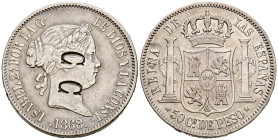 ISABEL II (1833-1868). 50 Centavos de Peso. (Ar. 12,88g/30mm). 1865. Manila. (Cal-2019-662). Resello C C, en anverso. MBC. Muy escasa.