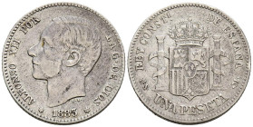 ALFONSO XII (1874-1885). 1 Peseta. (Ar. 4,86/23mm). 1883 *18-83. Madrid MSM. (Cal-2019-21). MBC-. Estrellas visibles. Escasa.