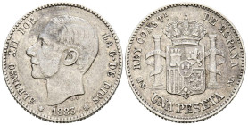 ALFONSO XII (1874-1885). 1 Peseta (Ar. 4,96g/23mm). 1883 *18-83. Madrid MSM. (Cal-2019-21). MBC-. Primera estrella parcialmente visible.