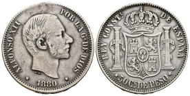 ALFONSO XII (1874-1885). 50 Centavos. (Ar. 12,80g/30mm). 1880. Manila. (Cal-2019-112). MBC-/MBC. Agujero a las 12 cuidadosamente tapado. Escasa.
