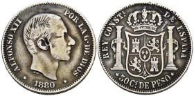 ALFONSO XII (1874-1885). 50 Centavos de Peso. (Ar. 12,78g/30mm). 1880. Manila. (Cal-2019-112). BC/BC+. Rara.