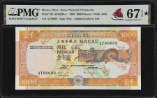 MACAU. Banco Nacional Ultramarino. 1000 Patacas, 1999. P-75b. KNB62b-c. PMG Superb Gem Uncirculated 67 EPQ*.
Serial number AT88693. A PMG star note!...