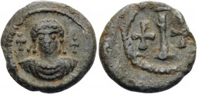 Maurice Tiberius, 582-602. (Lead, 17 mm, 3.52 g, 7 h), Decanummium, Italian mint. Crowned and cuirassed bust of Maurice Tiberius facing, franked by tw...