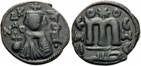 ISLAMIC, Umayyad Caliphate. temp. 'Abd al-Malik ibn Marwan, AH 65-86 / AD 685-705. Fals (Bronze, 18 mm, 3.22 g, 6 h), Arab-Byzantine 'Imperial bust' t...
