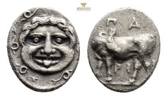Mysia, Parion AR Hemidrachm. 4th century BC. Bull standing to left, head reverted; ΠA-PI above and below, round bowl below / Facing gorgoneion. Traité...