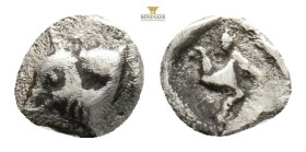 LYCIA. Limyra. Obol (Circa 440-430 BC). 0,24 g. 5,9 mm.
Obv: Head of cow left.
Rev: Triskeles and lycian legend within incuse square