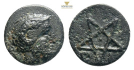 Mysia, Pitane AE (bronze, 1 g, 10,1 mm.) ca 4th century BC.
Obv: Head of Zeus right, wearing horn of Ammon.
Rev: Π - Ι, Pentagram.
Ref: SNG Copenhagen...