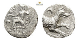 Lykaonia, Laranda AR Obol. Circa 324/3 BC. Baaltars seated left, holding grain ear, grape bunch, and scepter / Forepart of wolf right; inverted cresce...
