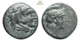 Mysia, Pergamon. ca. 310-284 B.C. AE 0,98 g. 9,7 mm. Head of Herakles right, wearing lion's skin headdress / ΠEP, Helmeted head of Athena right. SNG C...