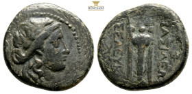 Seleukid King of Syria. . Seleukos II Kallinikos 246-226 BC.
Bronze Æ, 22,2 mm., 7,6 g.
Laureate head of Apollo right / BAΣIΛEΩΣ ΣEΛEYKOY, Tripod; mon...