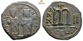 FOCAS 602-610. AE-Follis 27,5 mm. 9.9 g, 607/608) AD Theupolis. Focas and Leontia stand in regalia v.v.; above cross D N FOCA - NE PE AV / value m bet...