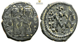 Phocas, with Leontia (602-610 AD)
AE Follis(22,3 mm 4,5 g)
Obv: Phocas on left, holding globus cruciger, and Leontia on right, holding cruciform scept...